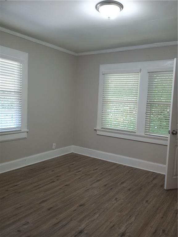 1131 Indale Pl SW, Atlanta, GA 30310 - unfurnished room featuring dark wood-type flooring, ornamental molding, and baseboards