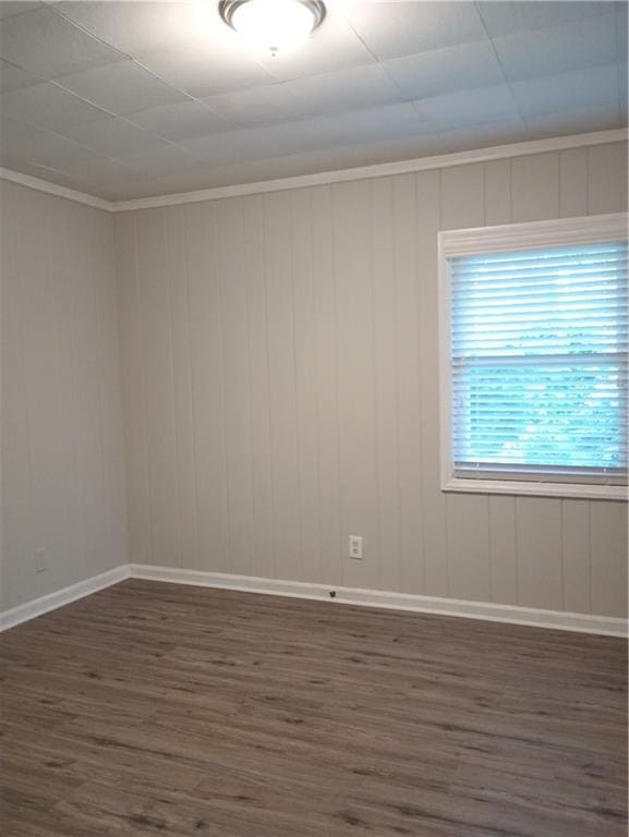 1131 Indale Pl SW, Atlanta, GA 30310 - spare room featuring dark wood finished floors and ornamental molding