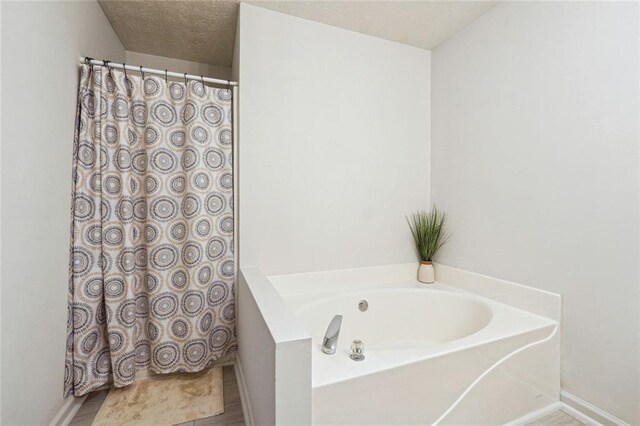 bathroom featuring a bathtub