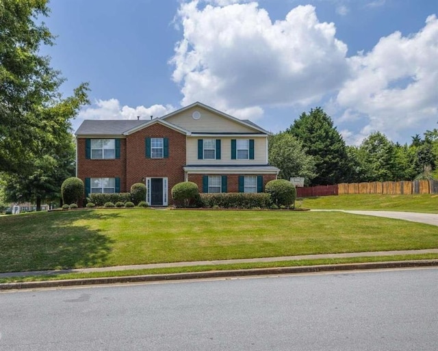 view of front of home with a front lawn