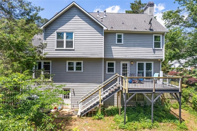 2196 Kildare Way NW, Kennesaw, GA 30152 - rear view of property with a chimney, a wooden deck, and stairway