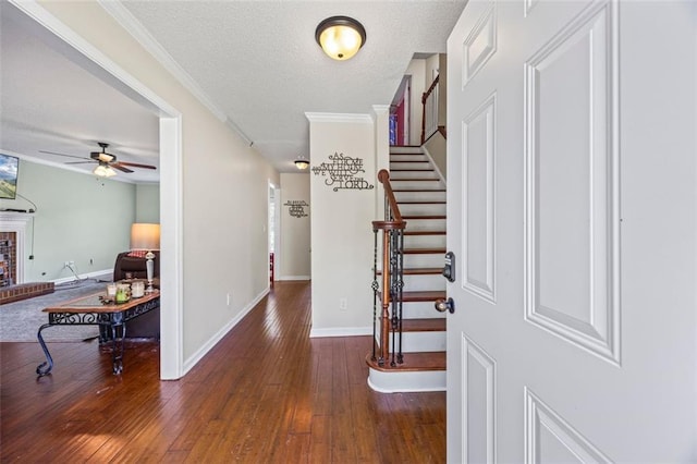 2196 Kildare Way NW, Kennesaw, GA 30152 - foyer entrance with a ceiling fan, hardwood / wood-style floors, baseboards, stairway, and a textured ceiling
