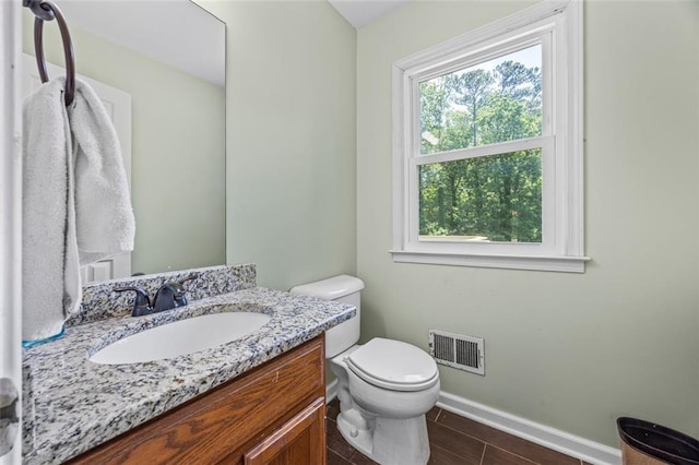 2196 Kildare Way NW, Kennesaw, GA 30152 - bathroom featuring toilet, vanity, and baseboards
