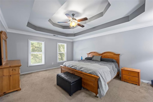 2196 Kildare Way NW, Kennesaw, GA 30152 - bedroom with a tray ceiling, carpet, baseboards, crown molding, and a ceiling fan