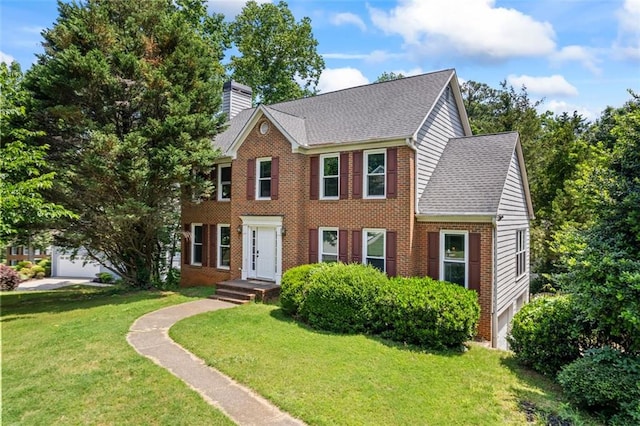 2196 Kildare Way NW, Kennesaw, GA 30152 - colonial-style house with a chimney, a front lawn, brick siding, and a shingled roof