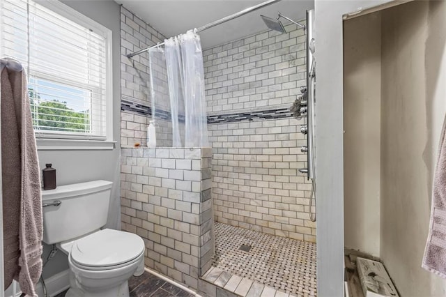 2196 Kildare Way NW, Kennesaw, GA 30152 - full bath with tiled shower, toilet, and wood finished floors