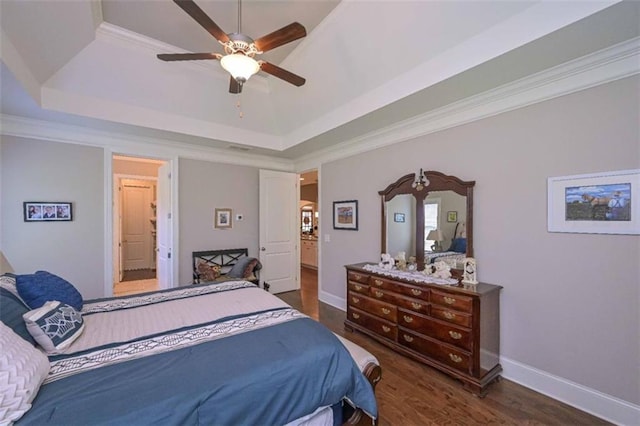 295 Hanover Dr, Villa Rica, GA 30180 - bedroom featuring a tray ceiling, wood finished floors, baseboards, and ceiling fan