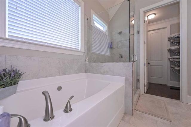 295 Hanover Dr, Villa Rica, GA 30180 - full bathroom with a garden tub, a shower stall, and tile patterned floors