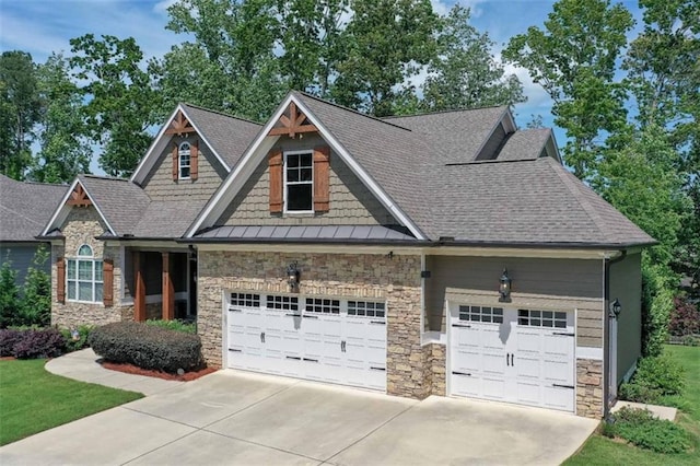 295 Hanover Dr, Villa Rica, GA 30180 - craftsman-style home featuring stone siding, a garage, driveway, and a shingled roof