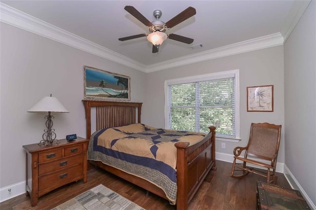 295 Hanover Dr, Villa Rica, GA 30180 - bedroom featuring crown molding, dark wood-type flooring, baseboards, and ceiling fan