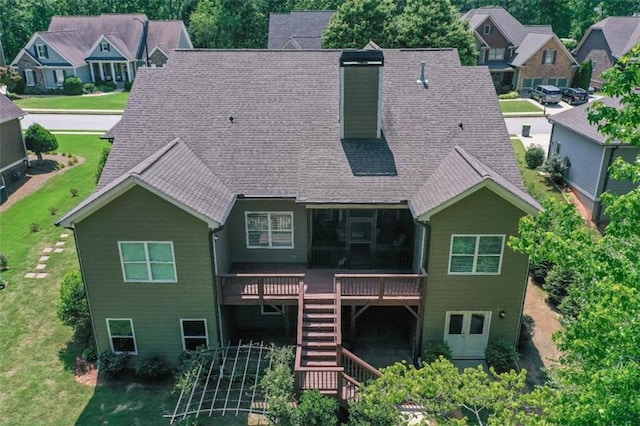 295 Hanover Dr, Villa Rica, GA 30180 - rear view of property featuring a deck, stairs, roof with shingles, and a lawn