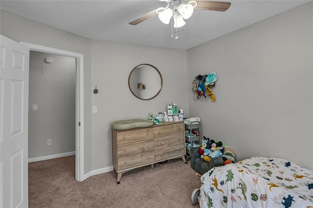 bedroom with light colored carpet and ceiling fan