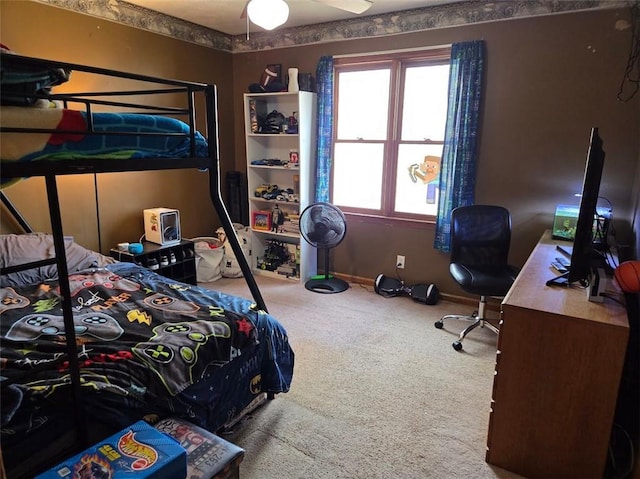 bedroom with carpet and baseboards