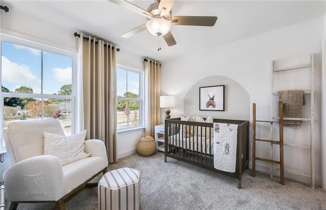 126 Jane Blvd NW, Cartersville, GA 30120 - bedroom with carpet flooring, baseboards, a crib, and a ceiling fan