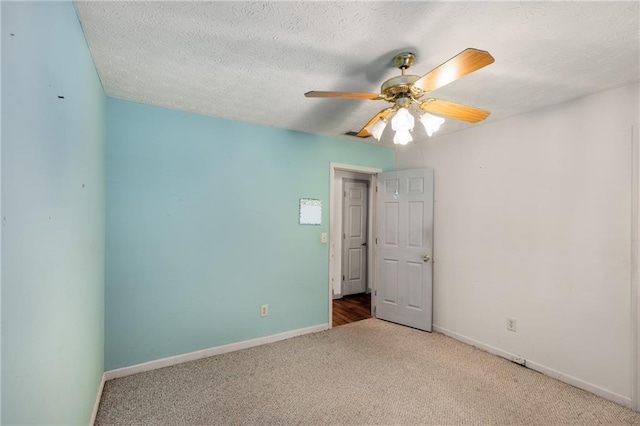 2617 Laurel Woods Ln SE, Conyers, GA 30094 - carpeted empty room with a ceiling fan and a textured ceiling