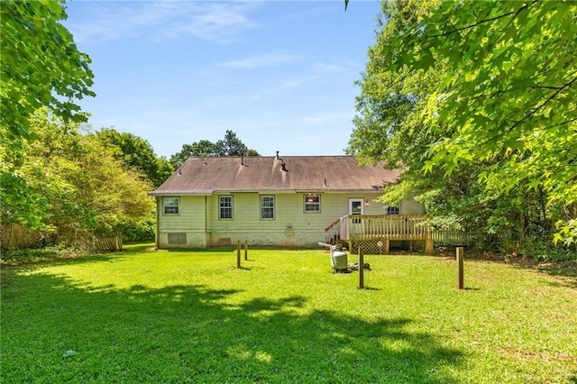 2617 Laurel Woods Ln SE, Conyers, GA 30094 - back of house with a yard, a deck, and crawl space