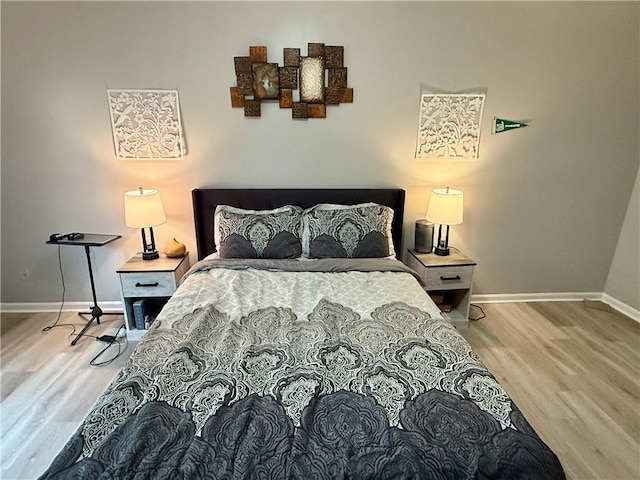 6851 Roswell Rd Unit D33, Atlanta, GA 30328 - bedroom featuring baseboards and wood finished floors