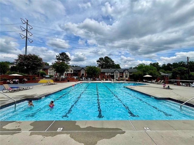 6851 Roswell Rd Unit D33, Atlanta, GA 30328 - community pool featuring a patio area