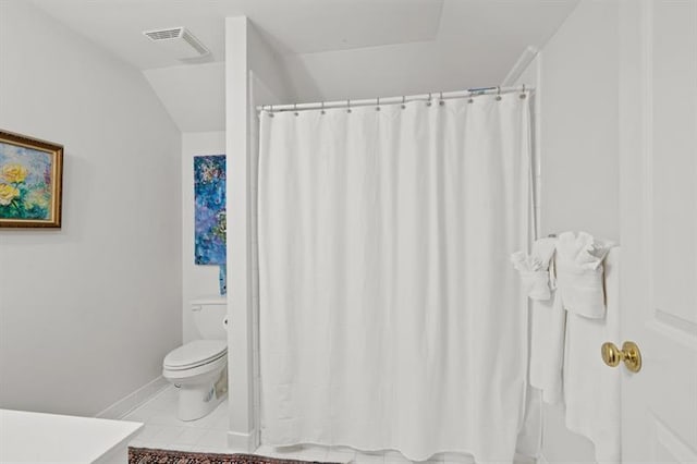 bathroom with tile patterned floors, vanity, and toilet