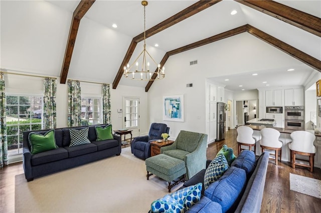 living room featuring high vaulted ceiling, visible vents, beamed ceiling, dark wood finished floors, and an inviting chandelier