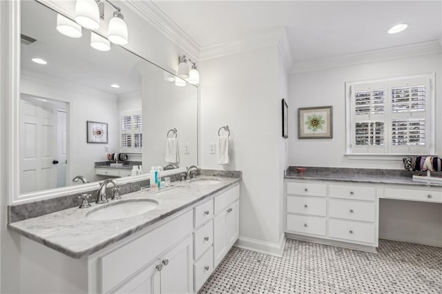 full bathroom with double vanity, baseboards, ornamental molding, and a sink