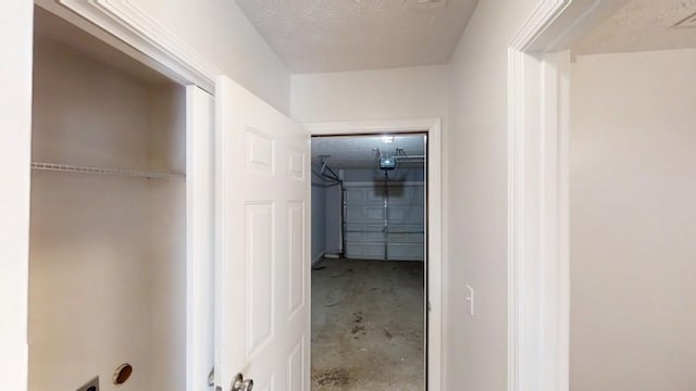364 Springhaven Way, Lawrenceville, GA 30046 - corridor with unfinished concrete floors and a textured ceiling