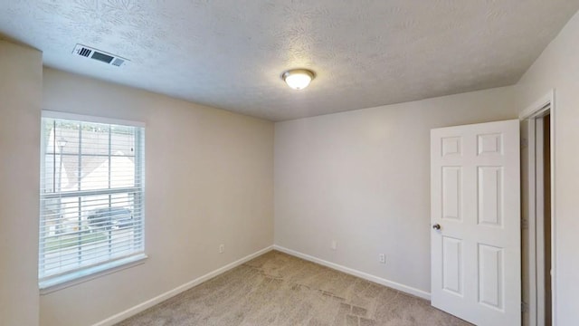 364 Springhaven Way, Lawrenceville, GA 30046 - unfurnished room with light carpet and a textured ceiling