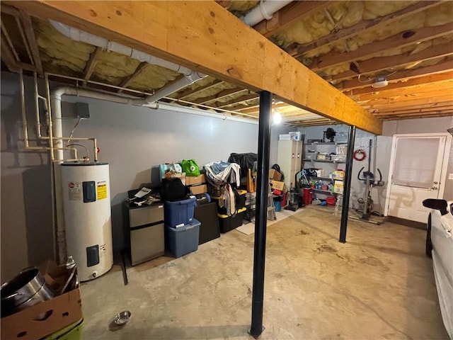 basement featuring electric water heater