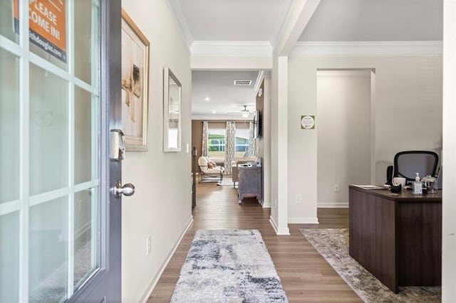 office area with crown molding, ceiling fan, and hardwood / wood-style floors