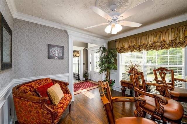 7282 Litany Ct, Flowery Branch, GA 30542 - sitting room featuring hardwood / wood-style flooring, wainscoting, ornamental molding, and a ceiling fan