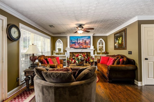 7282 Litany Ct, Flowery Branch, GA 30542 - living area featuring a ceiling fan, wood finished floors, baseboards, and ornamental molding