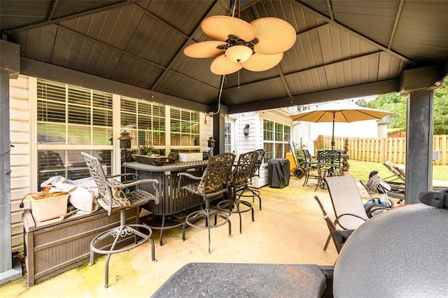 7282 Litany Ct, Flowery Branch, GA 30542 - view of patio featuring outdoor dining area, a ceiling fan, and a gazebo