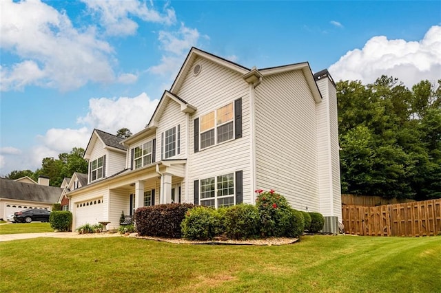 7282 Litany Ct, Flowery Branch, GA 30542 - traditional-style house featuring a garage and concrete driveway