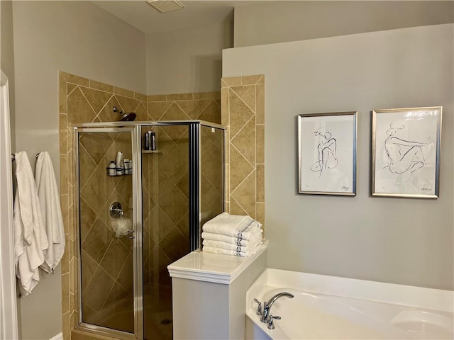 bathroom with independent shower and bath