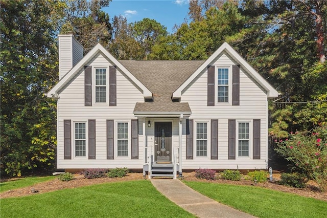 view of front of home with a front yard