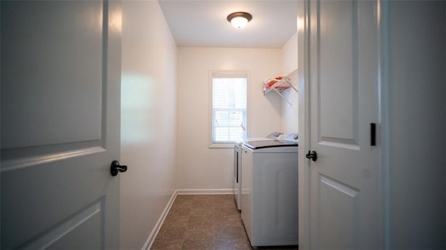 washroom with tile patterned floors and separate washer and dryer