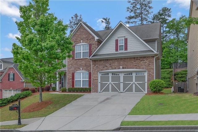 craftsman inspired home with a garage, a front yard, and central AC