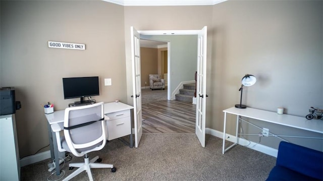 carpeted office with ornamental molding