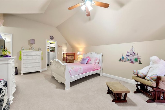 carpeted bedroom featuring vaulted ceiling, baseboards, and ceiling fan