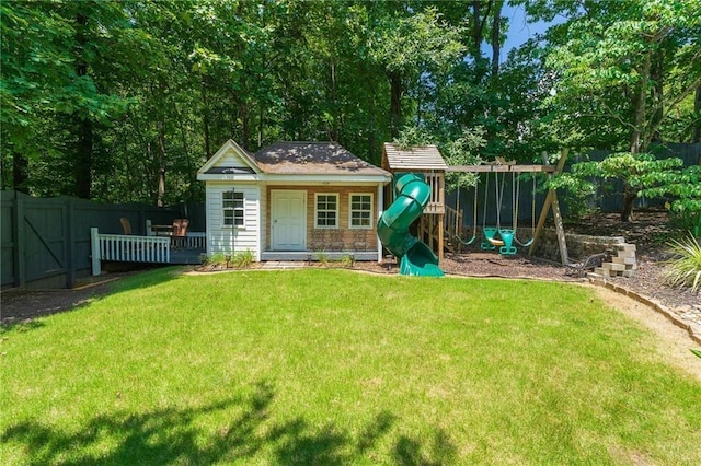 exterior space with a fenced backyard and a playground