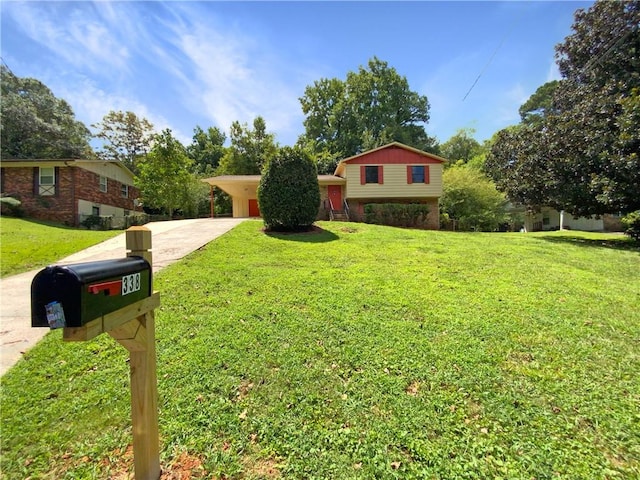 split level home with a front yard