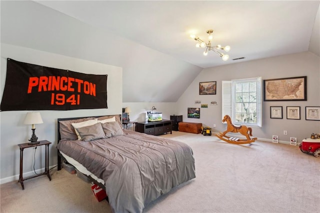 bedroom featuring carpet floors, vaulted ceiling, and a notable chandelier