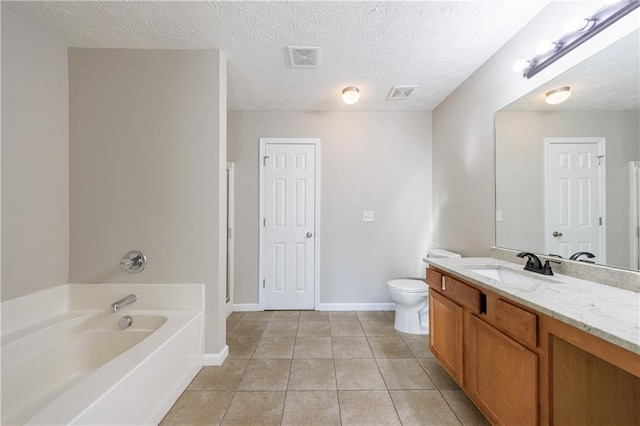 bathroom with visible vents, toilet, a garden tub, tile patterned floors, and vanity