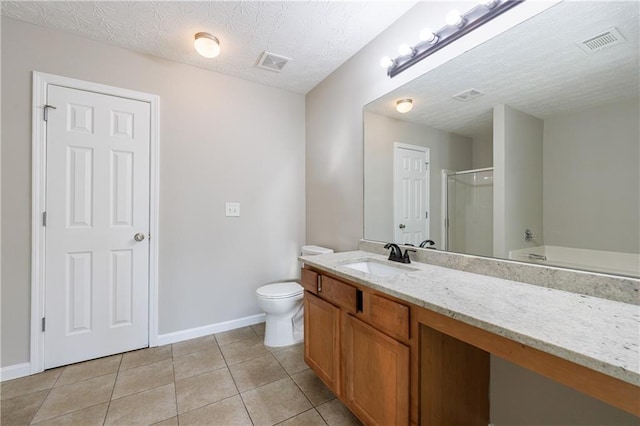 bathroom featuring tile patterned flooring, a shower stall, vanity, and visible vents