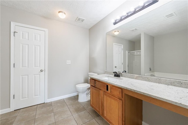 full bath featuring vanity, visible vents, tile patterned flooring, an enclosed shower, and a textured ceiling