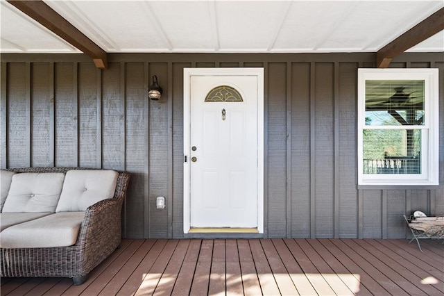 entrance to property featuring board and batten siding