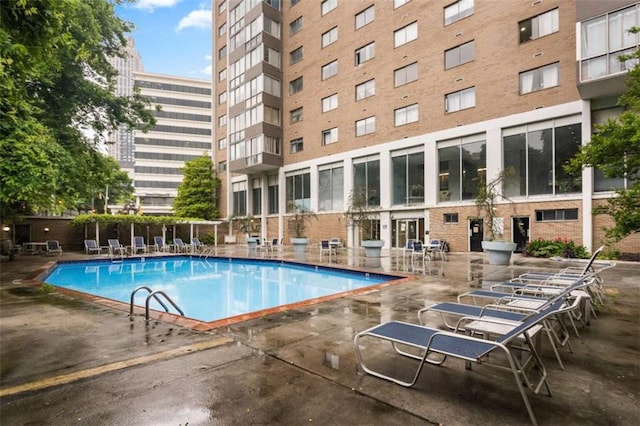 view of pool with a patio