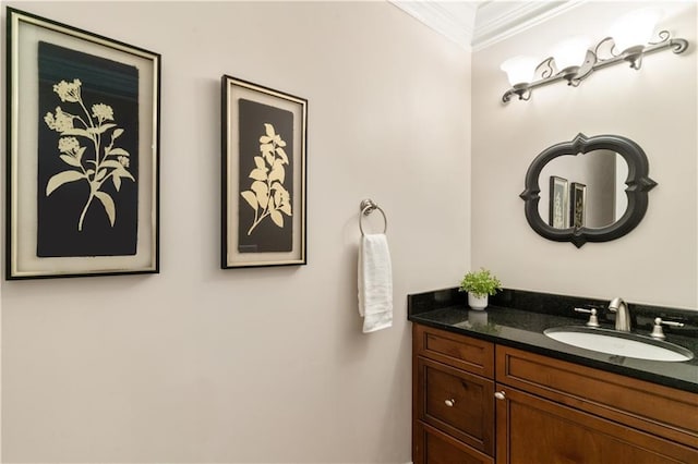 bathroom featuring vanity and ornamental molding