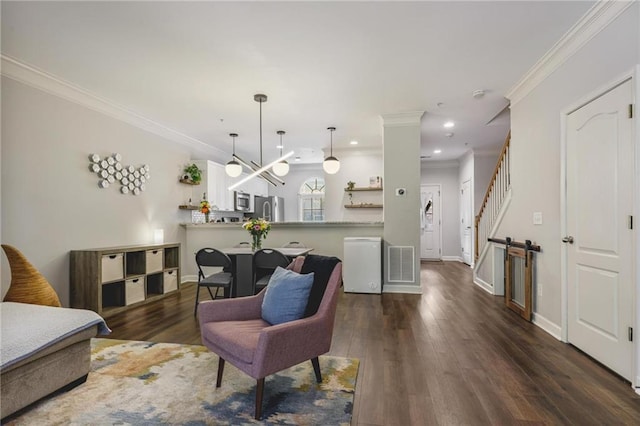 1244 Harris Commons Pl, Roswell, GA 30076 - living area with crown molding, dark wood-type flooring, recessed lighting, and stairway