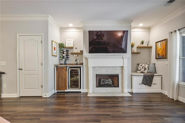 1244 Harris Commons Pl, Roswell, GA 30076 - living room with wine cooler, wood finished floors, crown molding, recessed lighting, and a fireplace with flush hearth